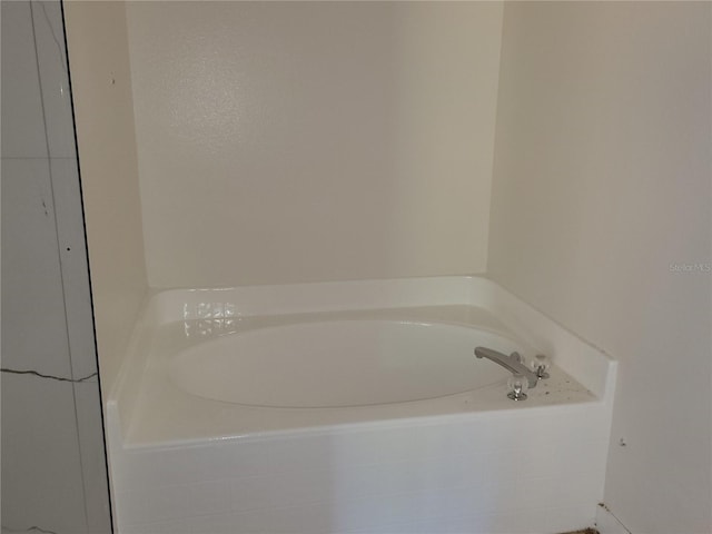 full bath with a bath