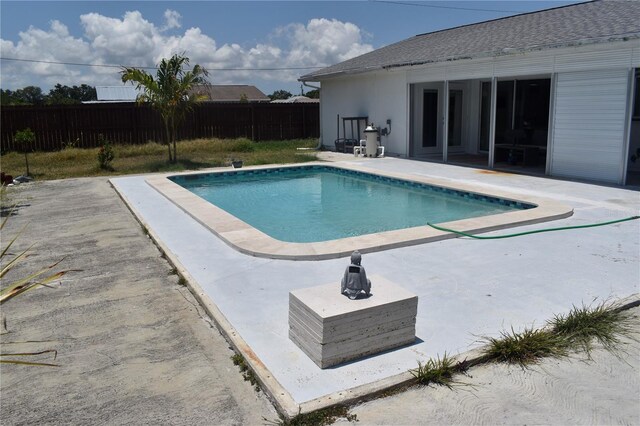 821 Silver Springs Ter NW, Port Charlotte, FL 33948 - view of swimming pool with a fenced backyard and a patio area