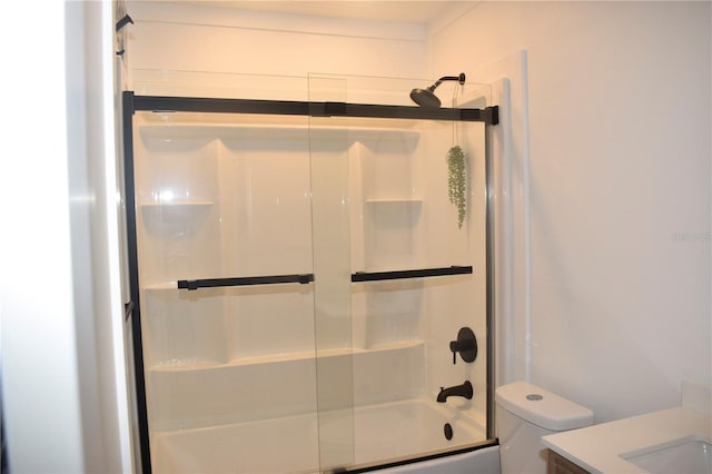 821 Silver Springs Ter NW, Port Charlotte, FL 33948 - bathroom with toilet, vanity, and enclosed tub / shower combo