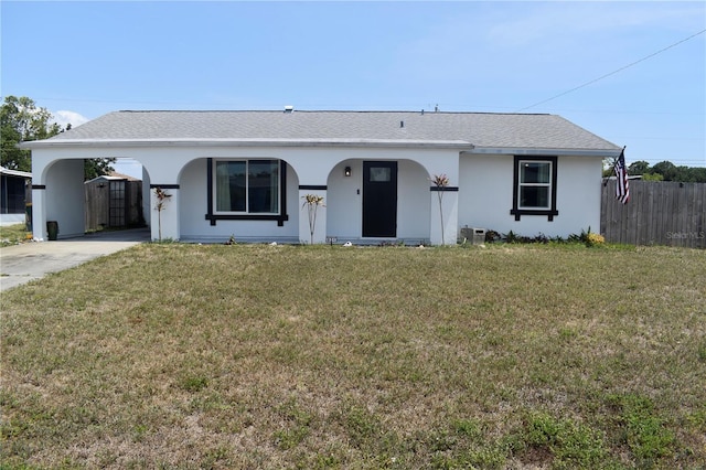 821 Silver Springs Ter NW, Port Charlotte, FL 33948 - ranch-style house with concrete driveway, a carport, and stucco siding
