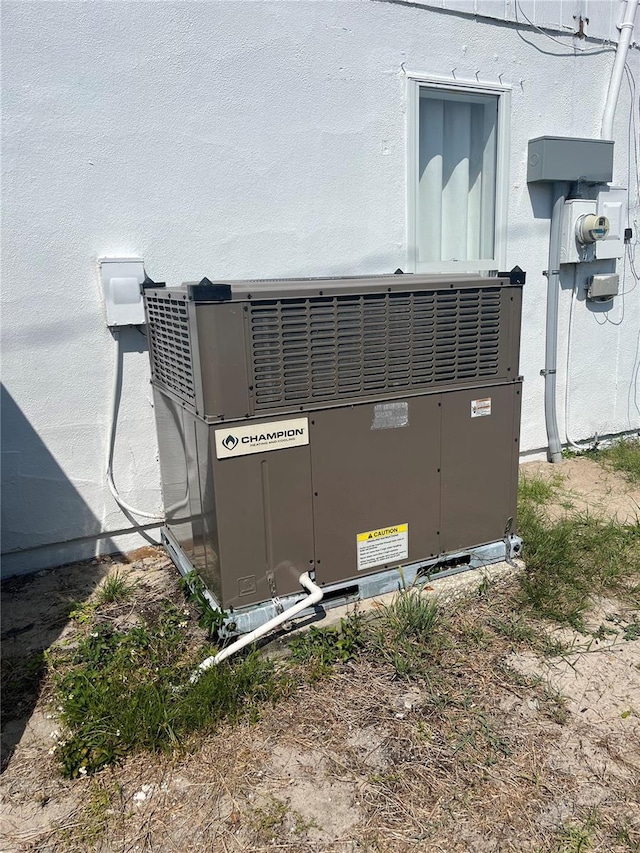 821 Silver Springs Ter NW, Port Charlotte, FL 33948 - exterior view of central AC and electric meter