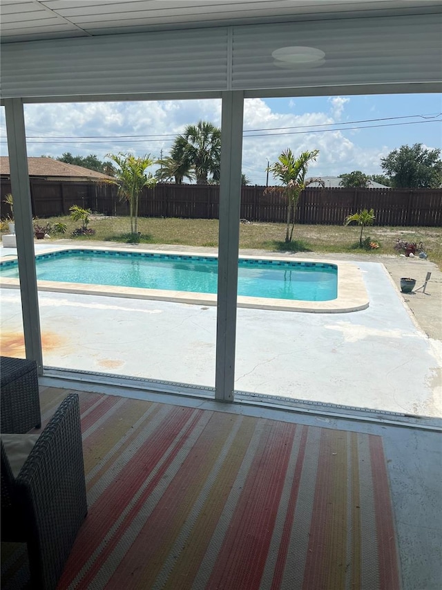 821 Silver Springs Ter NW, Port Charlotte, FL 33948 - view of pool with a fenced backyard and a patio area