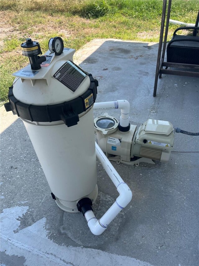 821 Silver Springs Ter NW, Port Charlotte, FL 33948 - exterior view of pump