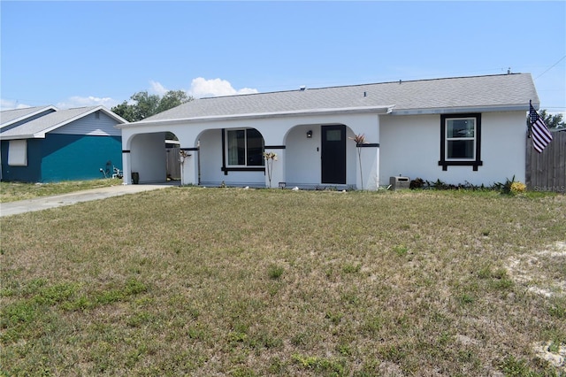 821 Silver Springs Ter NW, Port Charlotte, FL 33948 - ranch-style home with concrete driveway, a carport, a porch, and stucco siding