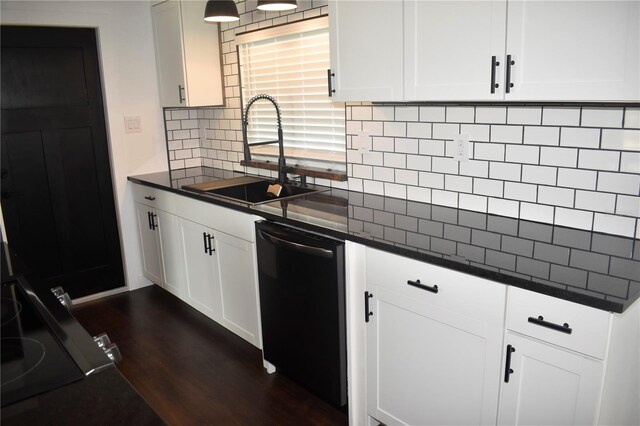 821 Silver Springs Ter NW, Port Charlotte, FL 33948 - kitchen with dishwasher, a sink, dark countertops, and decorative backsplash