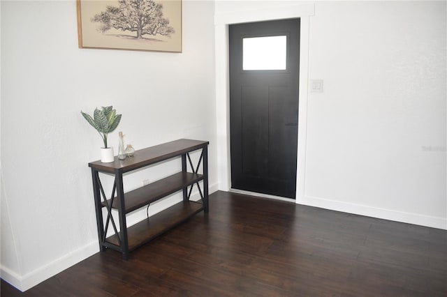 821 Silver Springs Ter NW, Port Charlotte, FL 33948 - entrance foyer with baseboards and wood finished floors