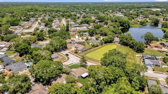 aerial view of residential area with a nearby body of water