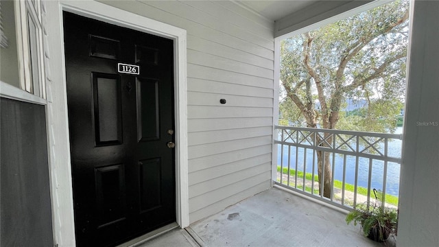 2314 Midtown Ter Unit 1126, Orlando, FL 32839 - view of exterior entry with a water view