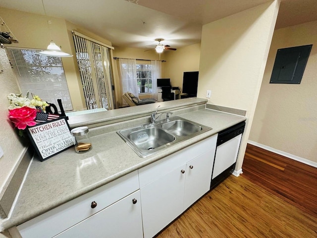 2314 Midtown Ter Unit 1126, Orlando, FL 32839 - kitchen with dishwasher, electric panel, a ceiling fan, wood finished floors, and white cabinetry