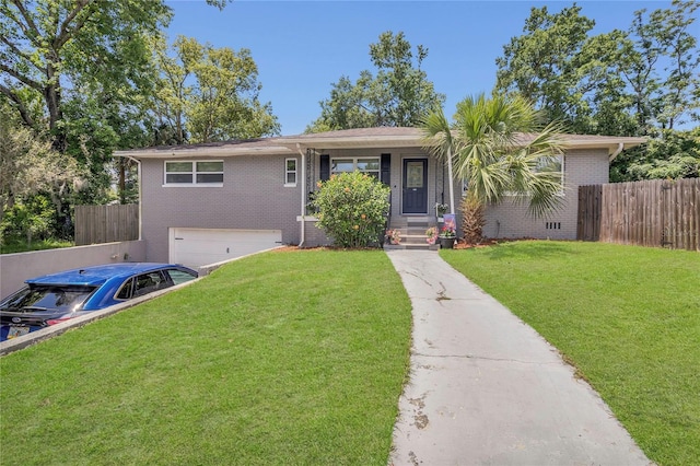 300 Hickory Ct, Apopka, FL 32712 - view of front of property featuring brick siding, an attached garage, and driveway