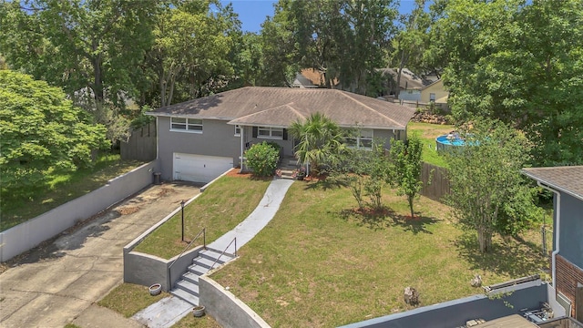300 Hickory Ct, Apopka, FL 32712 - view of front of home with an attached garage, driveway, and stucco siding