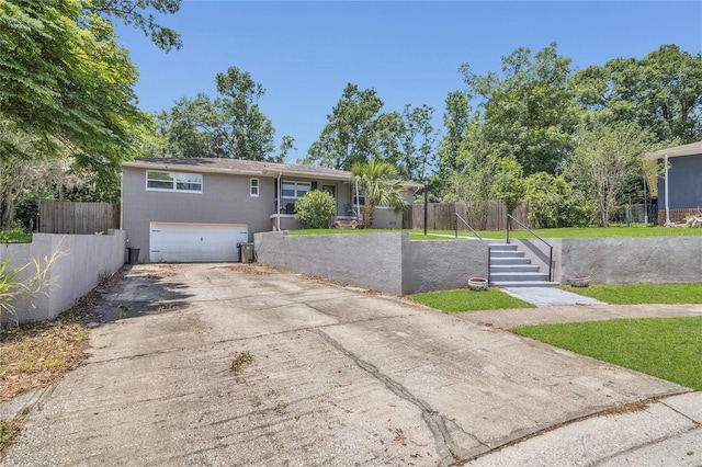 300 Hickory Ct, Apopka, FL 32712 - ranch-style house featuring driveway, fence, and a garage