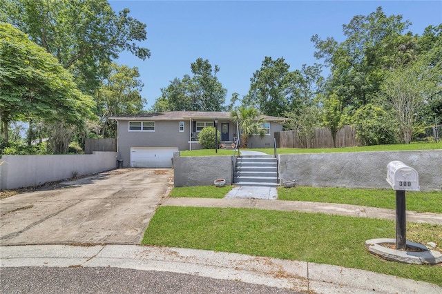 300 Hickory Ct, Apopka, FL 32712 - view of front of home with driveway, stucco siding, and an attached garage