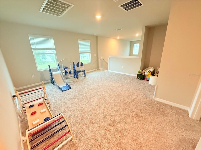 game room featuring carpet and baseboards