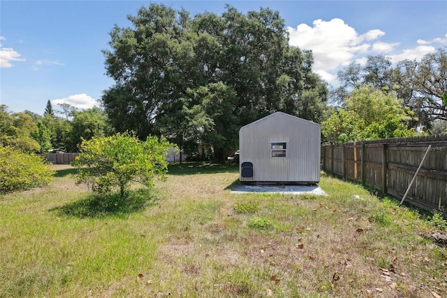 view of yard with a storage unit and an outdoor structure