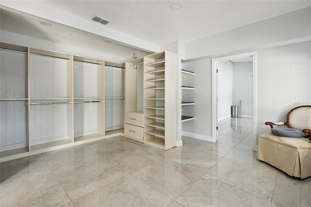 949 Shadow Oaks Rd, Kissimmee, FL 34744 - spacious closet with light marble finish flooring