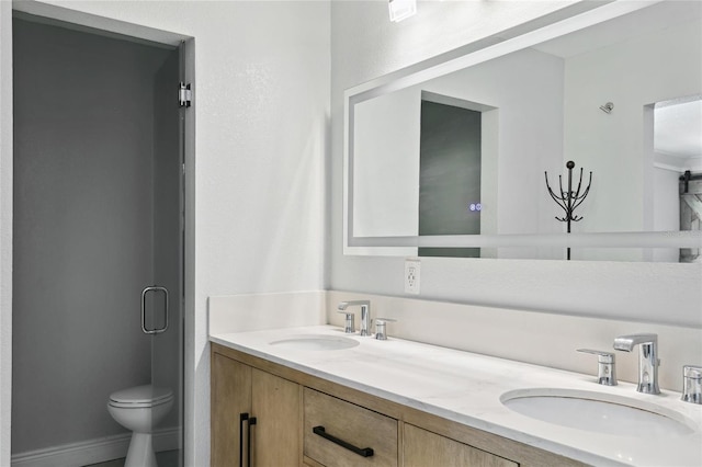 949 Shadow Oaks Rd, Kissimmee, FL 34744 - bathroom with double vanity and toilet