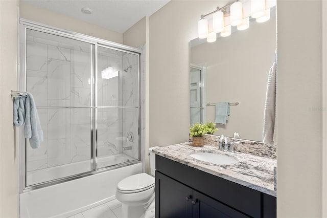 15420 Southern Martin St, Winter Garden, FL 34787 - full bathroom featuring vanity, bath / shower combo with glass door, and toilet