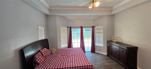 8612 Valley Ridge Ct, Orlando, FL 32818 - bedroom featuring wood finished floors, crown molding, baseboards, and ceiling fan
