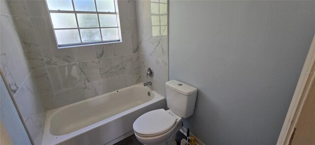 8612 Valley Ridge Ct, Orlando, FL 32818 - bathroom featuring toilet and bathtub / shower combination