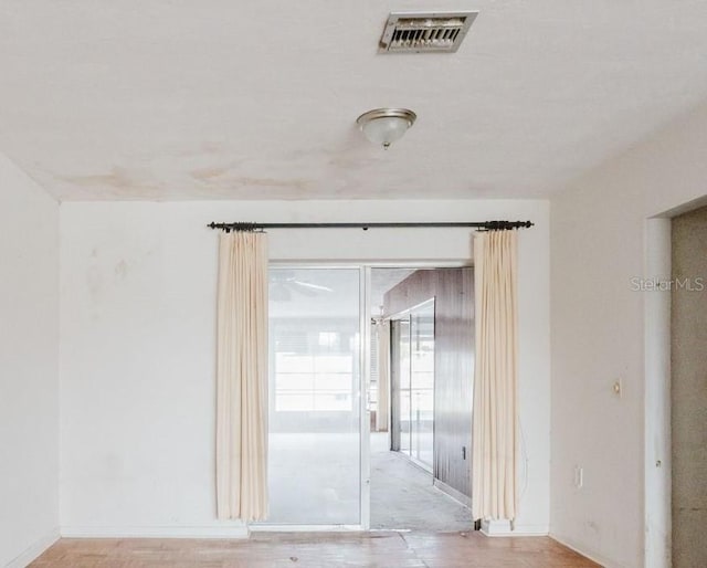 5500 Leeward Ln, New Port Richey, FL 34652 - unfurnished room with baseboards