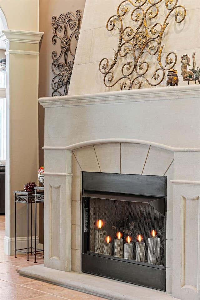 1070 Henley Downs Pl, Lake Mary, FL 32746 - detailed view of a tile fireplace, baseboards, and wood finished floors