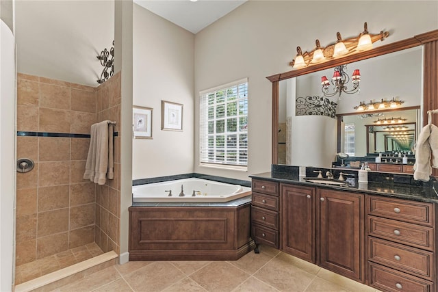 1070 Henley Downs Pl, Lake Mary, FL 32746 - bathroom featuring a garden tub, vanity, tiled shower, and tile patterned flooring