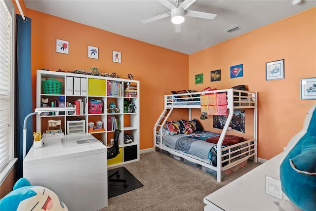 1070 Henley Downs Pl, Lake Mary, FL 32746 - carpeted bedroom with an office area, a ceiling fan, and baseboards