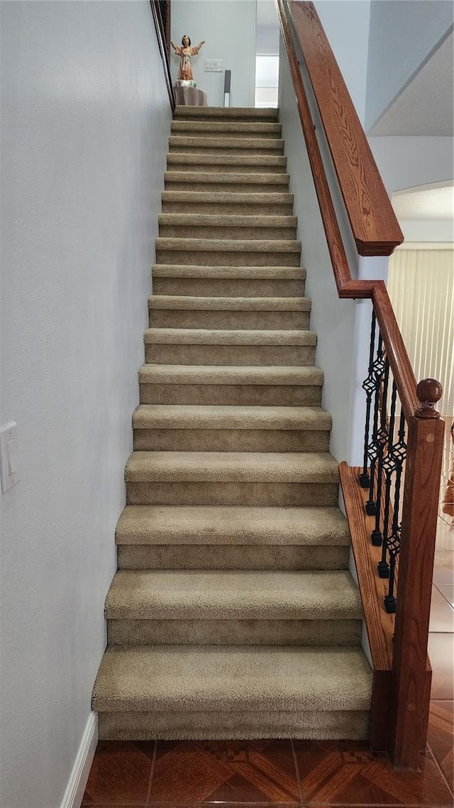 2157 Island Walk Dr, Orlando, FL 32824 - staircase with baseboards
