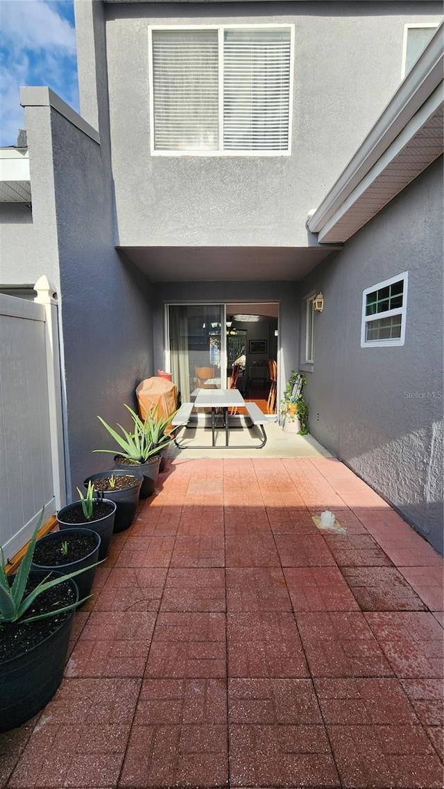 2157 Island Walk Dr, Orlando, FL 32824 - entrance to property featuring stucco siding