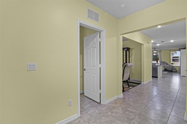 4051 Prairie Reserve Blvd, Orlando, FL 32824 - hall featuring light tile patterned floors, baseboards, and recessed lighting