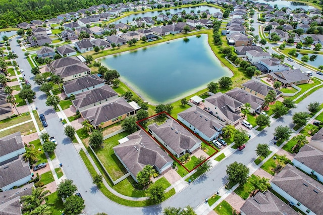 4051 Prairie Reserve Blvd, Orlando, FL 32824 - aerial view of residential area with property boundaries highlighted and a large body of water