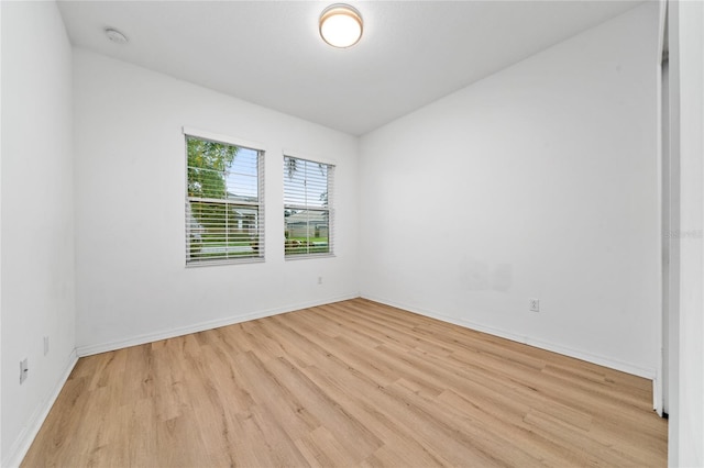 15862 Citrus Grove Loop, Winter Garden, FL 34787 - unfurnished room with light wood finished floors, baseboards, and a smoke detector