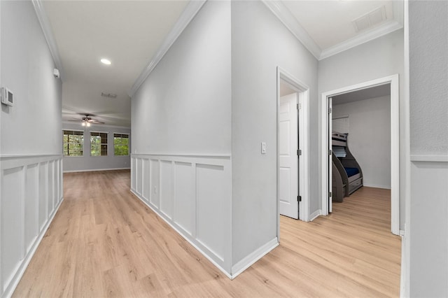 15862 Citrus Grove Loop, Winter Garden, FL 34787 - hallway featuring light wood finished floors, crown molding, recessed lighting, and baseboards