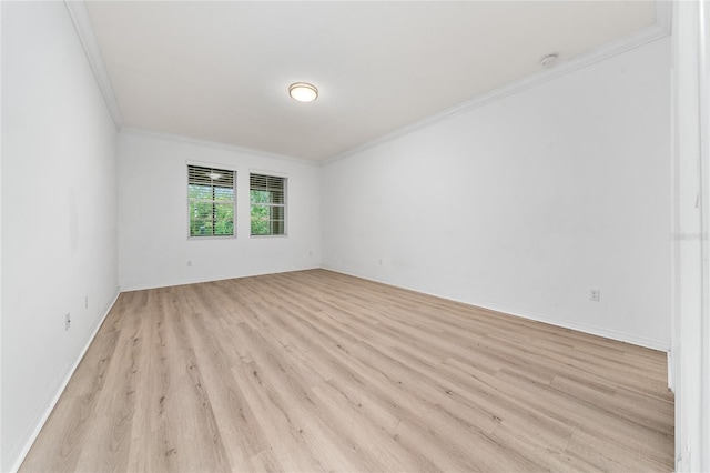 15862 Citrus Grove Loop, Winter Garden, FL 34787 - unfurnished room featuring crown molding and light wood-style flooring