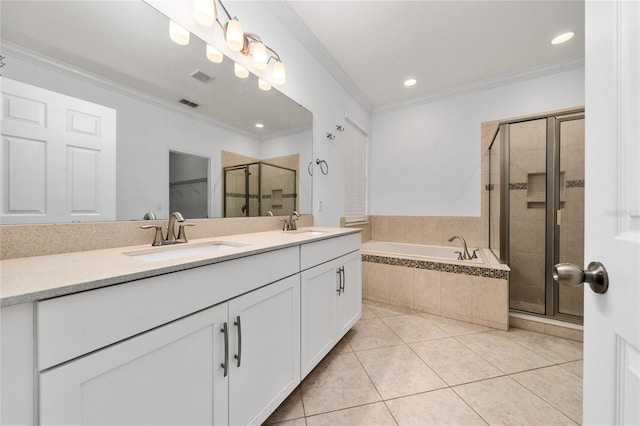 15862 Citrus Grove Loop, Winter Garden, FL 34787 - bathroom with a shower stall, tile patterned floors, double vanity, ornamental molding, and a bath