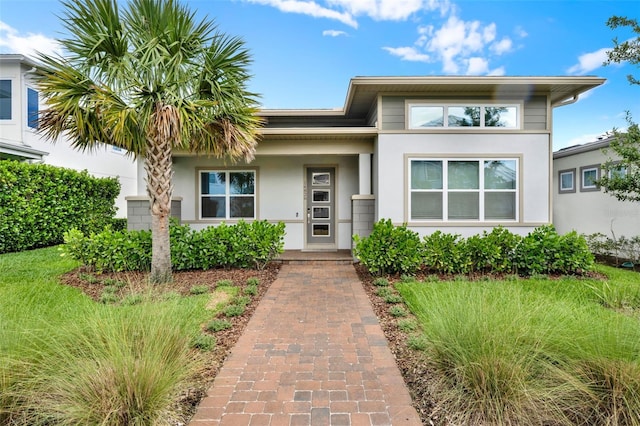 14826 Deaton Aly, Orlando, FL 32827 - view of front facade featuring stucco siding