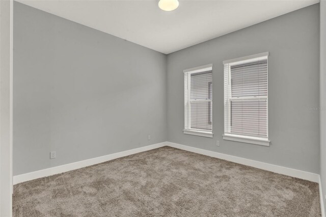 14826 Deaton Aly, Orlando, FL 32827 - carpeted spare room with baseboards