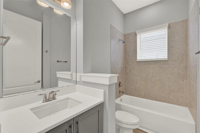 14826 Deaton Aly, Orlando, FL 32827 - full bathroom featuring shower / washtub combination, toilet, and vanity