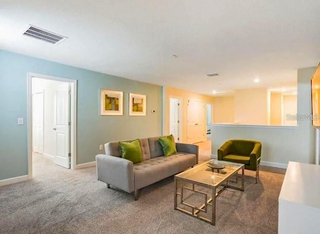 1575 Plunker Dr, Davenport, FL 33896 - carpeted living area featuring baseboards