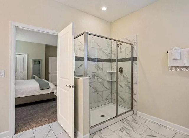1575 Plunker Dr, Davenport, FL 33896 - ensuite bathroom featuring marble finish floors, a marble finish shower, and recessed lighting