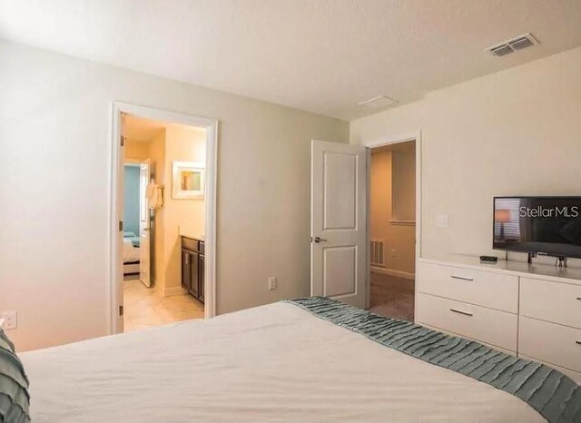 1575 Plunker Dr, Davenport, FL 33896 - bedroom with connected bathroom