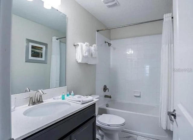 1575 Plunker Dr, Davenport, FL 33896 - bathroom with vanity, shower / bathtub combination with curtain, and marble look tile flooring