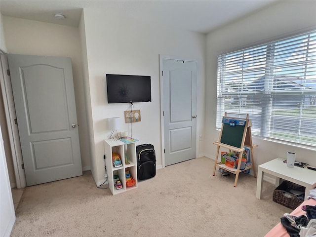 3329 Royal Tern Dr, Winter Haven, FL 33881 - recreation room featuring healthy amount of natural light and carpet
