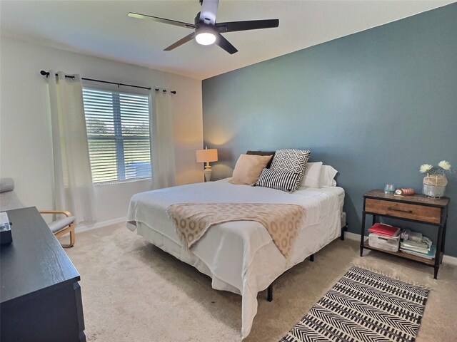 3329 Royal Tern Dr, Winter Haven, FL 33881 - bedroom with carpet flooring, ceiling fan, and baseboards