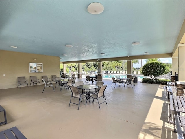 3329 Royal Tern Dr, Winter Haven, FL 33881 - view of patio / terrace featuring a community pool