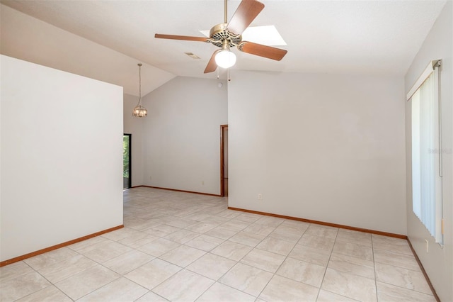 empty room featuring a ceiling fan, baseboards, light tile patterned floors, a chandelier, and high vaulted ceiling