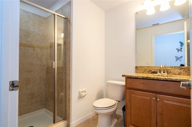 8919 Bismarck Palm Rd, Kissimmee, FL 34747 - full bath with a shower stall, toilet, baseboards, vanity, and tile patterned flooring