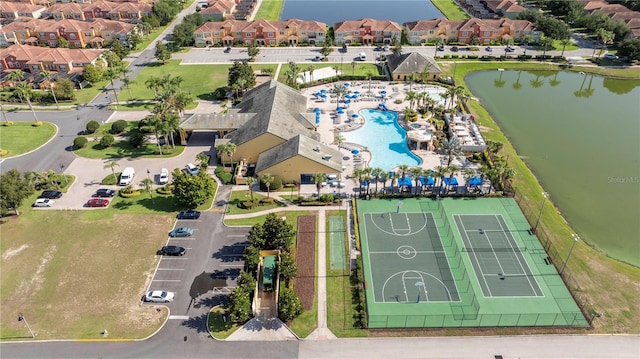 8919 Bismarck Palm Rd, Kissimmee, FL 34747 - bird's eye view of a pool and a nearby body of water