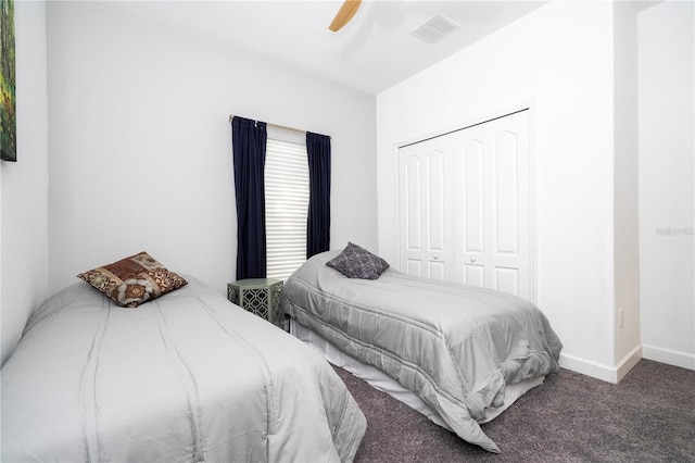 8919 Bismarck Palm Rd, Kissimmee, FL 34747 - carpeted bedroom with a closet, baseboards, and a ceiling fan